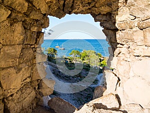 View of the sea through a gap in the wall of the Genoese fortress, Feodosia, Crimea