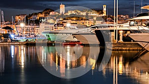 View of sea port in Cannes at night, France