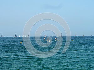 View of the sea. Sailboats, boats. Actively having a rest people on the sea.
