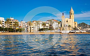 View from sea of Sitges beach and Church, Catalonia, Spain