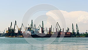 view of the seaport, docks, unloading of ships