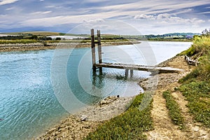 A view seaward down the River Ouse at Piddinghoe, UK