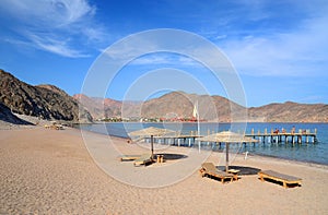 View on a secluded beach and the Gulf of Aqaba