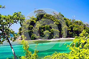 View on secluded islet with white sand and turquoise water - Blue lagoon in Portland, Jamaica