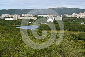 View of the Semenovsky lake and inhabited residential district of the city of Murmansk