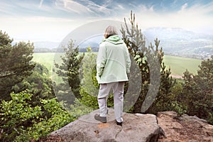 View of a senior woman at landscape scenery - Saxon Switzerland