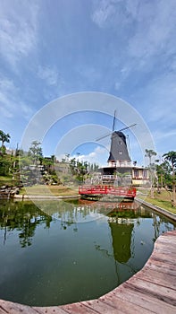 view of a serene man-made pond in the mountainous area of ??Tanah Karo in the early morning, in Indonesia