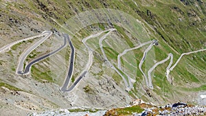 View of serpentine road of Stelvio Pass from above.