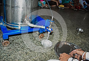 View of serving water in gurudwara sahib golden temple in Amritsar, Punjab