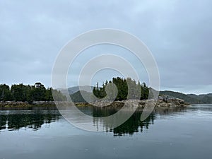 View of several islands on an overcast day along the Central Coast of British Columbia photo