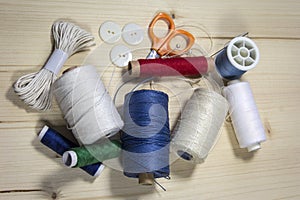 View of sewing thread and accessories on a table
