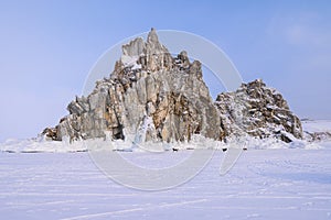 View of Shaman rock one of sacred place in frozen lake Baikal in winter season of Siberia, Russia.