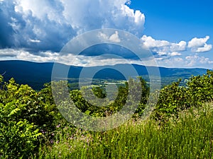View of the Shenandoah Valley seen from Shenandoah National Park, Virginia, USA, with dramatic clouds approaching