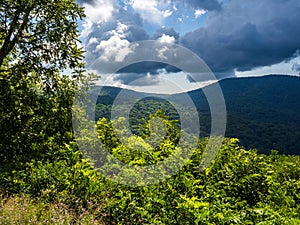 View of the Shenandoah Valley seen from Shenandoah National Park, Virginia, USA, with dramatic clouds approaching