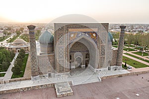 View of Sher-Dor Madrasa from minaret of Ulugbek Madrasah on Reg