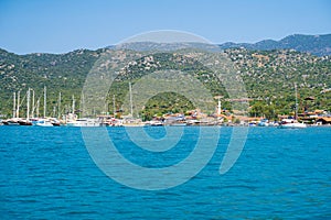 View of ships in the harbor of Kekova Ucagiz village. photo