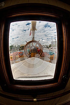 view on the ships steering wheel