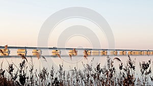 A view from the shore of a low-water bridge