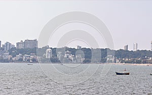 View of the shore of Mumbai with tall buildings