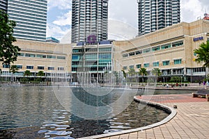 The view showcases the majestic Petronas Towers and the Suria KLCC mall, with its impressive fountains adorning the entrance area