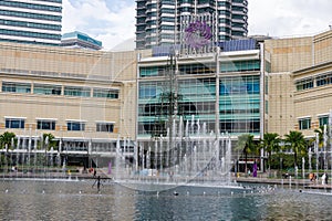 The view showcases the majestic Petronas Towers and the Suria KLCC mall, with its impressive fountains adorning the entrance area