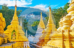 The view on Shwe Oo Min cave through the golden payas, Pindaya, Myanmar