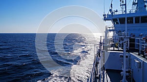 View of the side of a ship sailing in the open sea