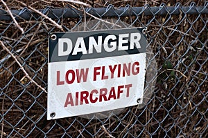 View of sign Caution Low Flying Aircraft at local airport in Courtenay