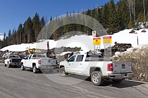 View of sign on Trans-Canada Highway `Danger. Avalanche Control using Explosives.