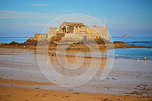 View of Sillon beach and and Fort National in Saint-Malo, Brittany, France photo