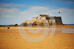 View of Sillon beach and and Fort National in Saint-Malo, Brittany, France photo