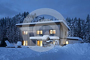 View of a single family house with solar thermal collectors on the facade for sustainable and renewable energy for heating