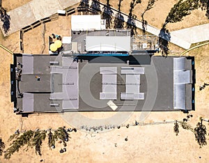 View of a skate park featuring ramps, rails, and half-pipes for skateboarders to enjoy