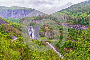 View of Skjervsfossen waterfall on a rainy summer day.Norway