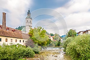 View at the Skofja Loka with Selca Sora river and Saint Jacob church in background - Slovenia