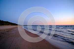 The view of the sky above the beach is very beautiful after sunset. Late evening by the Baltic Sea