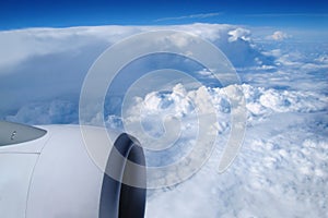 View of the sky and clouds from the airplane porthole