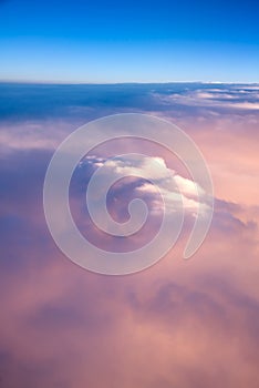 View of the sky and clouds from the airplane porthole