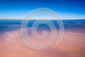 View of the sky and clouds from the airplane porthole