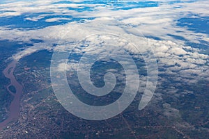 View of sky and land from airplane window