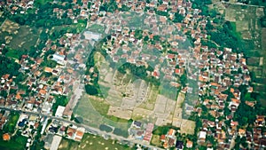 View from the sky of a landscape of rice fields and settlements