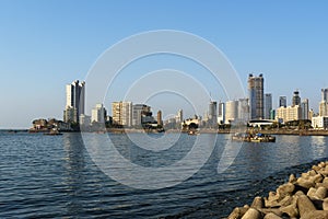 View of skyline on coast of Worli neighborhood from Haji Ali Dargah in Mumbai. India