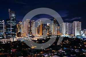 View of the skyline of Makati at night, in Metro Manila, The Phi photo