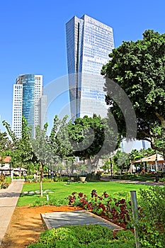 View of skyscrapers AfiSquare Tower left and Azrieli Sarona Tower right from Sarona open air commercial center in Tel Aviv