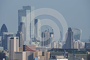 View of skyscrapers of city with sky in background at London