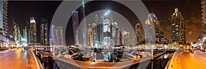 View of the skyscrapers of Dubai Marina district at night