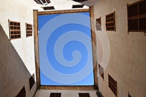 View skywards from a courtyard photo