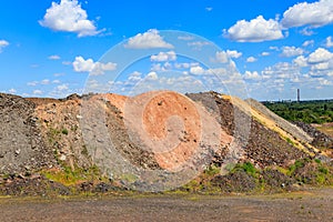 View of slag heaps of iron ore quarry. Mining industry