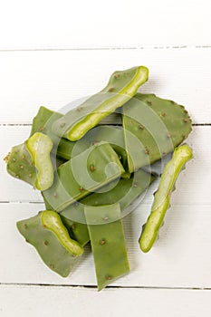 Sliced opuntia ficus-indica cactus leaf on a white background