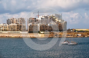 The view of Sliema city skyline from Valletta across Marsamxett photo
